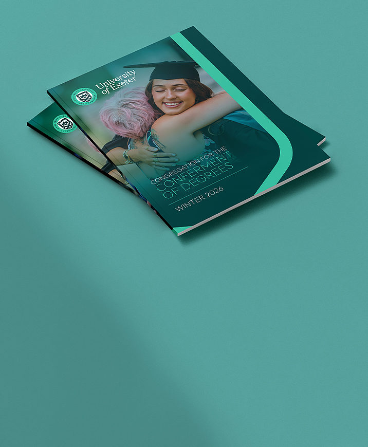 A stack of beautiful university of Exeter graduation brochures.